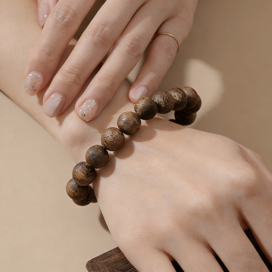 Kyara Agarwood Armband 10mm runde Perlen | Klassisches Kugeldesign | Natürliches Harzreich | Glatt poliert | Traditioneller Stil